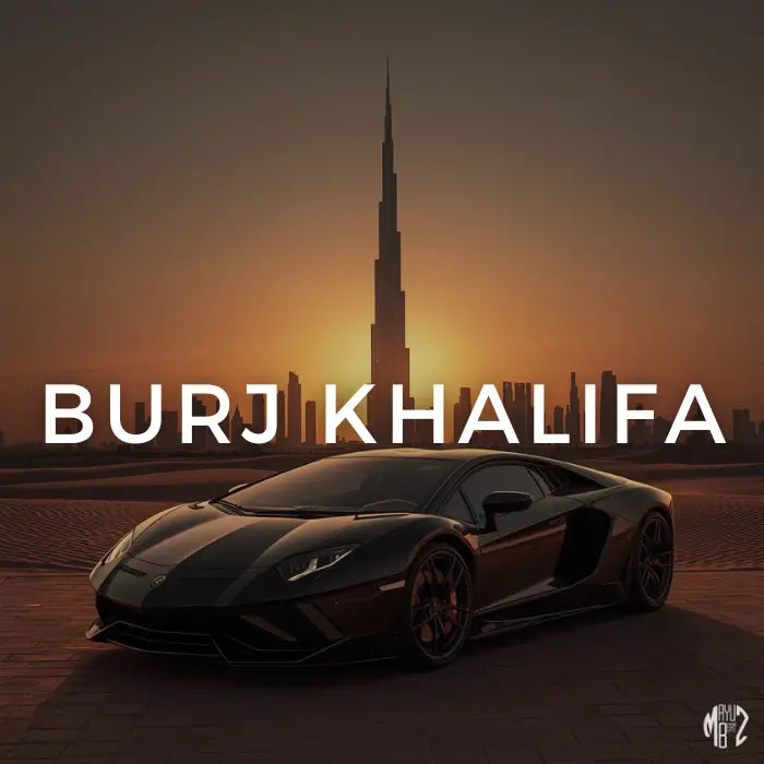 Black sports car in front of the Burj Khalifa at sunset.