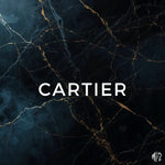 Cartier logo on a dark marble background
